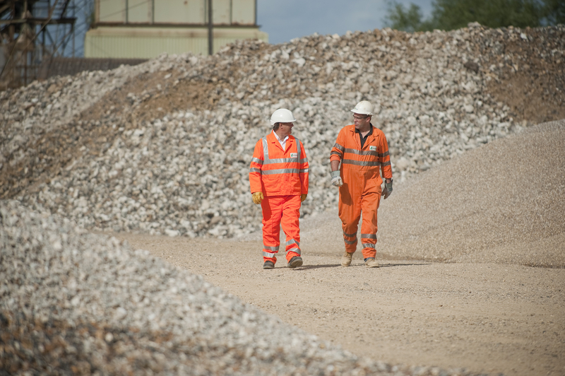 Aggregate workers walking
